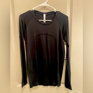 Lululemon black long sleeve tee. Size 8. NWT.